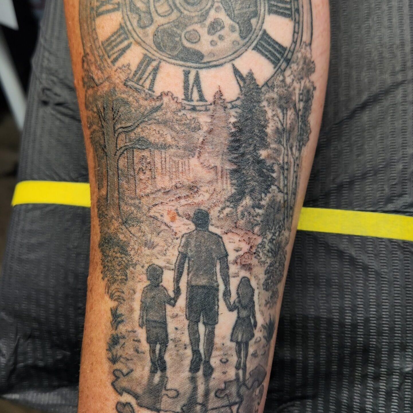 Family, Clock and Puzzle Memorial Tattoo